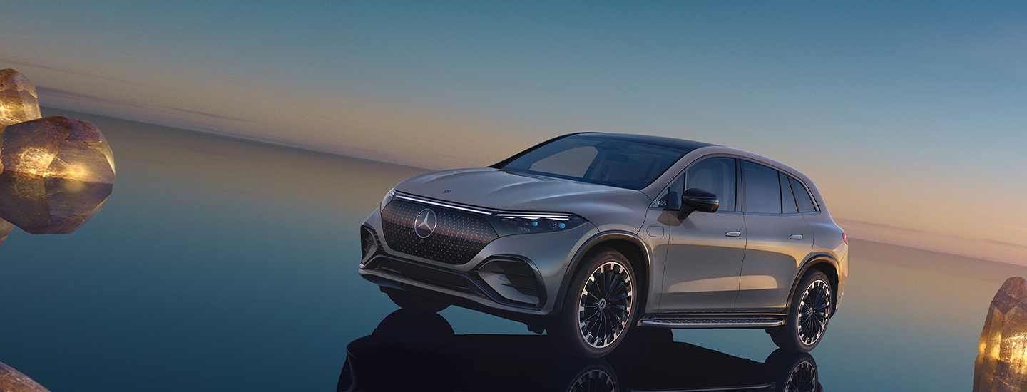 Gray Mercedes EQS SUV at dusk